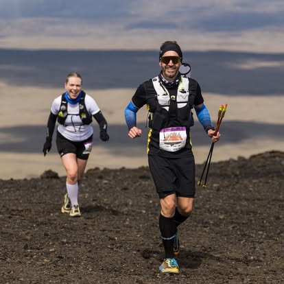 Runners climbing mountain trails at Hengill Ultra